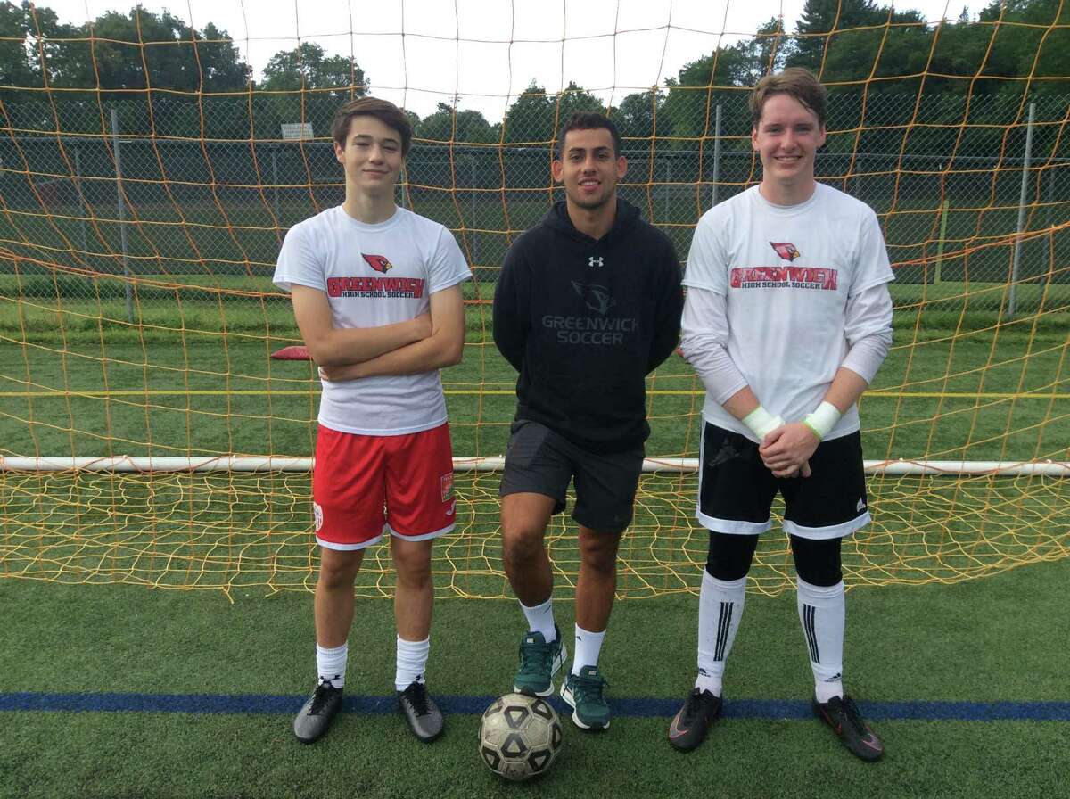 From left to right, Max Pisacreta, Davi Pedreiro and Padraig Colligan are senior captains on the Greenwich boys soccer team.