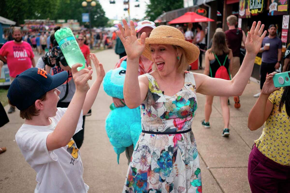 (FILES) In this file photo taken on August 10, 2019, Democratic presidential candidate Kirsten Gillibrand (R) and son Theodore visit the Iowa State Fair in Des Moines, Iowa. - Gillibrand announced on August 28, 2019, via a video on her twitter account she is dropping out of the 2020 Democratic presidential nomination. (Photo by ALEX EDELMAN / AFP)ALEX EDELMAN/AFP/Getty Images