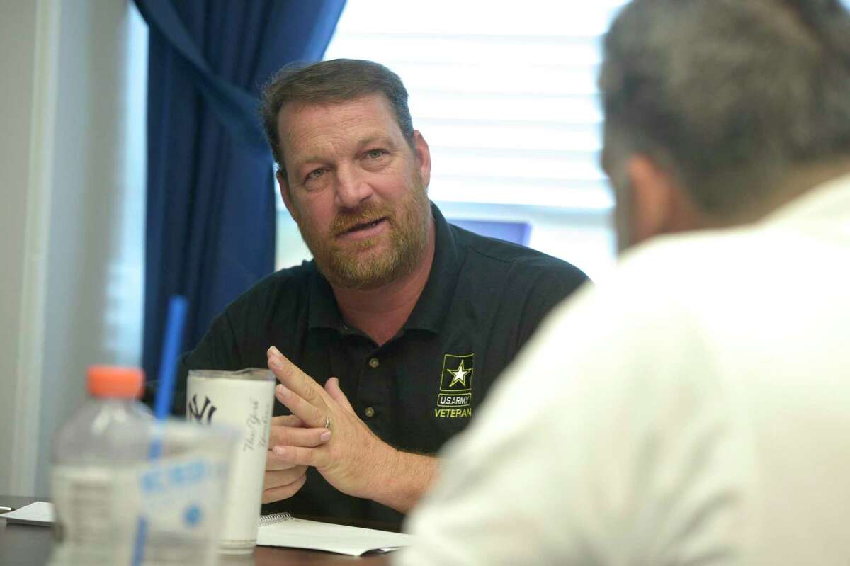 Tony Morrissey talks about his step-son Brian Cody Waldron with mayor Pete Bass on Tuesday. Waldron died from a drug overdose in August of 2019. August 27, 2019, in New Milford, Conn.