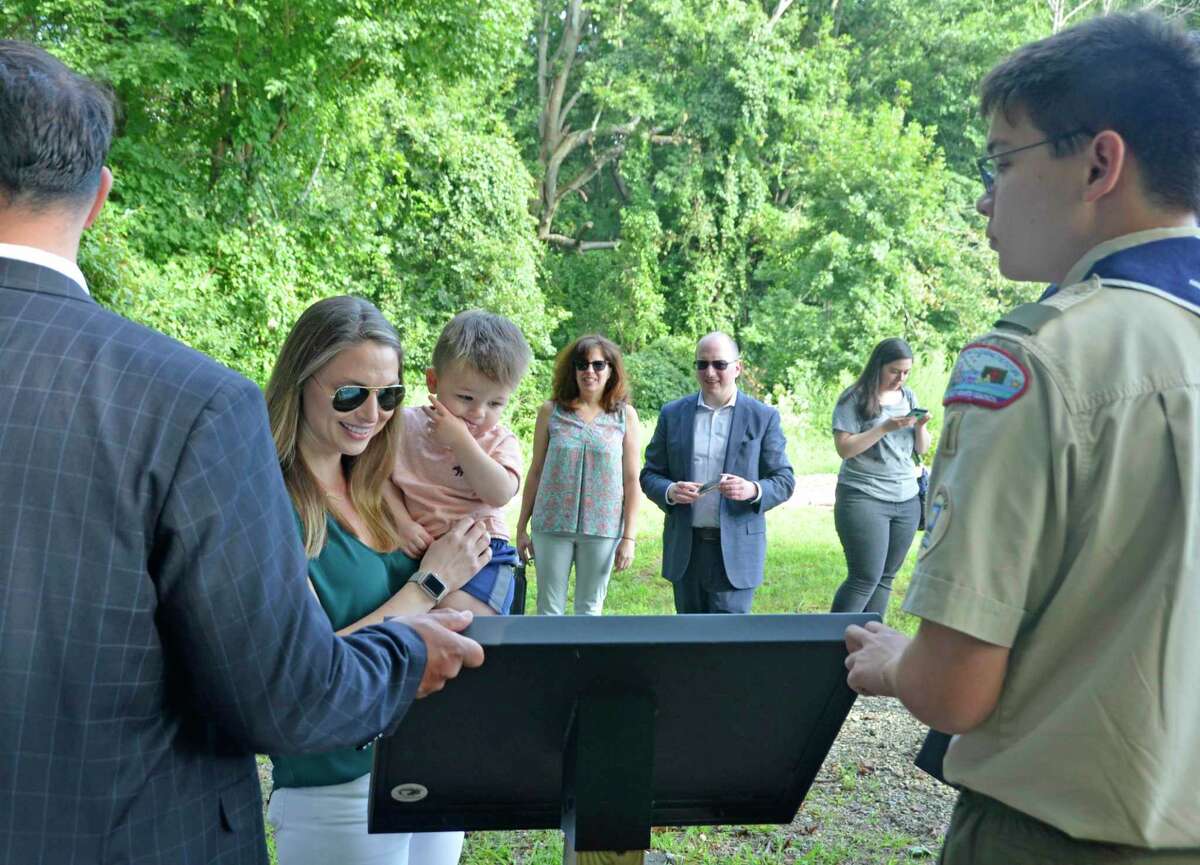 A ribbon cutting ceremony was held Saturday, Aug. 31, 2019 at Eisenhower Park for the new StoryWalk, brought to Milford by Marco Buschauer for his Eagle Scout project.