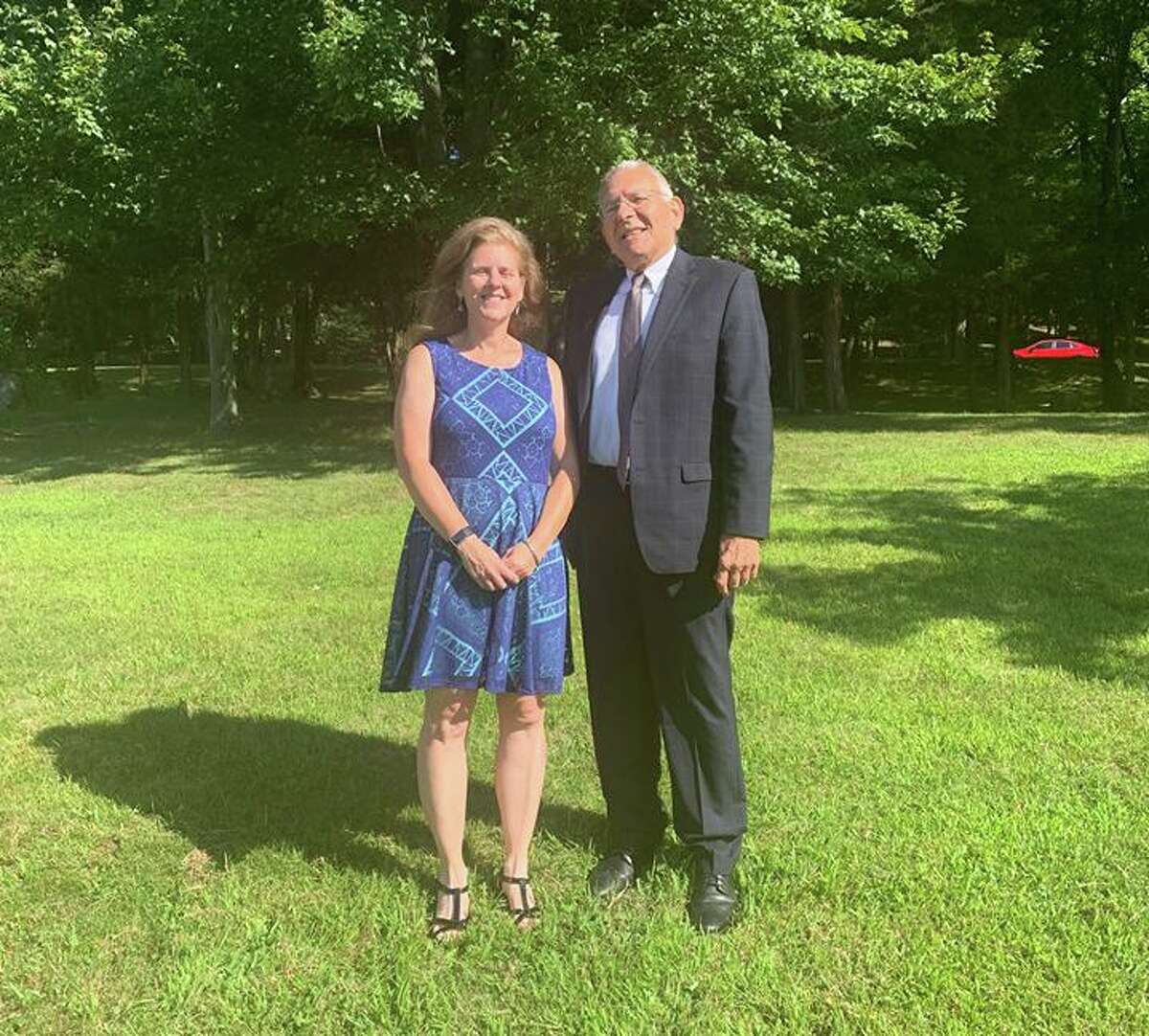 Trumbull's Teacher of the Year Lisa Cerulli, with Schools Superintendent Gary Cialfi. Cerulli, a social studies teacher at Madison Middle School, now moves on to the statewide Teacher of the Year competition.