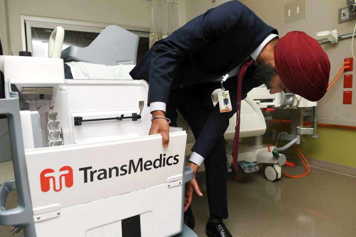 Dr. Tarunjeet Klair, surgical director of living liver donations at University Transplant Center in San Antonio, explains the workings of a machine that uses perfusion technology to help in preserving livers for transplants.