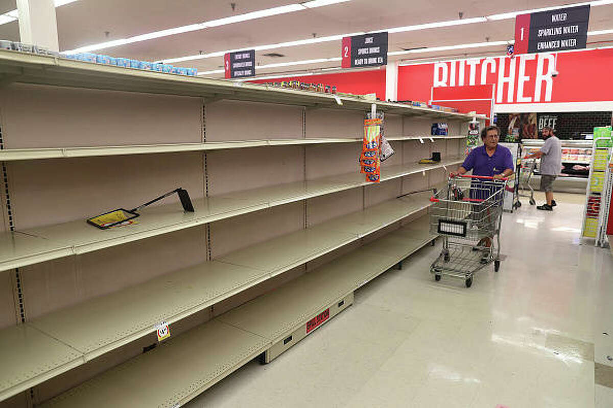 Empty shelves that held water are seen at a Winn Dixie store as people stock up before the arrival of Hurricane Dorian in Boynton Beach, Florida. (Photo by Joe Raedle/Getty Images)