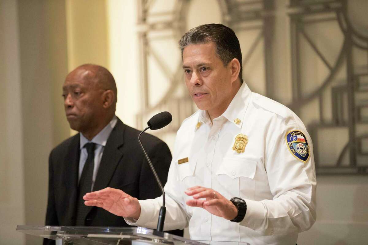 Houston Fire Department Chief Sam Pena, right, asked Mayor Sylvester Turner to boost the pay of HFD cadets. The mayor OK’d an $8,000-a-year increase earlier this month.