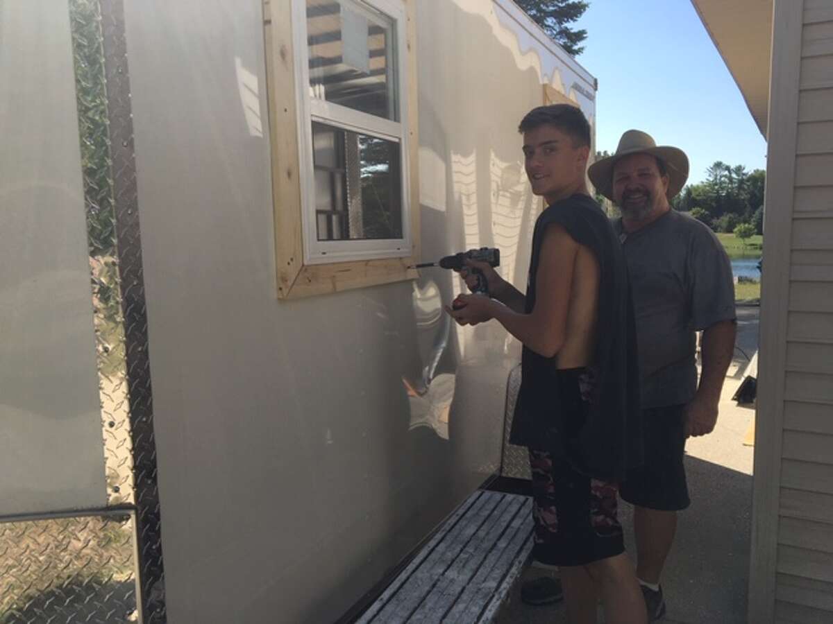 Gavyn Whyte and his father, George Whyte, have spent their free time working on the Mecosta County Commission on Aging's new "pie van." This van will make its debut at the 2019 Wheatland Music Festival. (Courtesy photo)