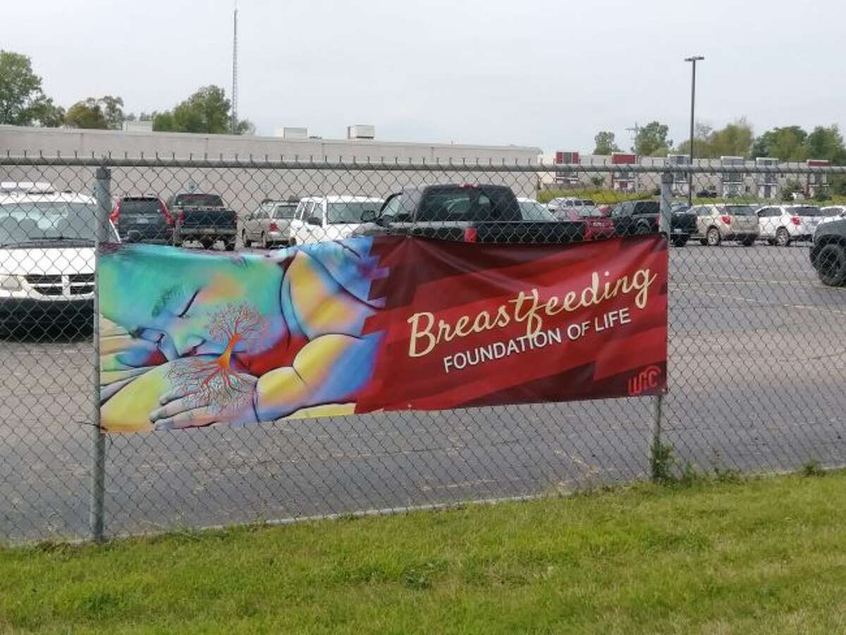 Featured is a banner posted outside of the Mecosta County Services Building. This banner, according to Breastfeeding Peer Counselor Tina McDonald, is in honor and celebration of Breastfeeding Awareness Month. (Pioneer photo/Alicia Jaimes)