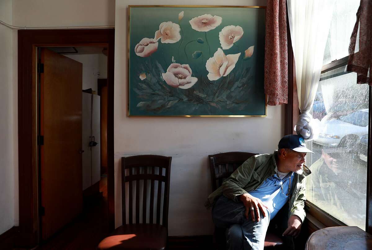 Steven Lax, 70, looks out of a window at a residential care facility, located at 969 Buena Vista West, in San Francisco, Calif., on Tuesday, September 3, 2019.