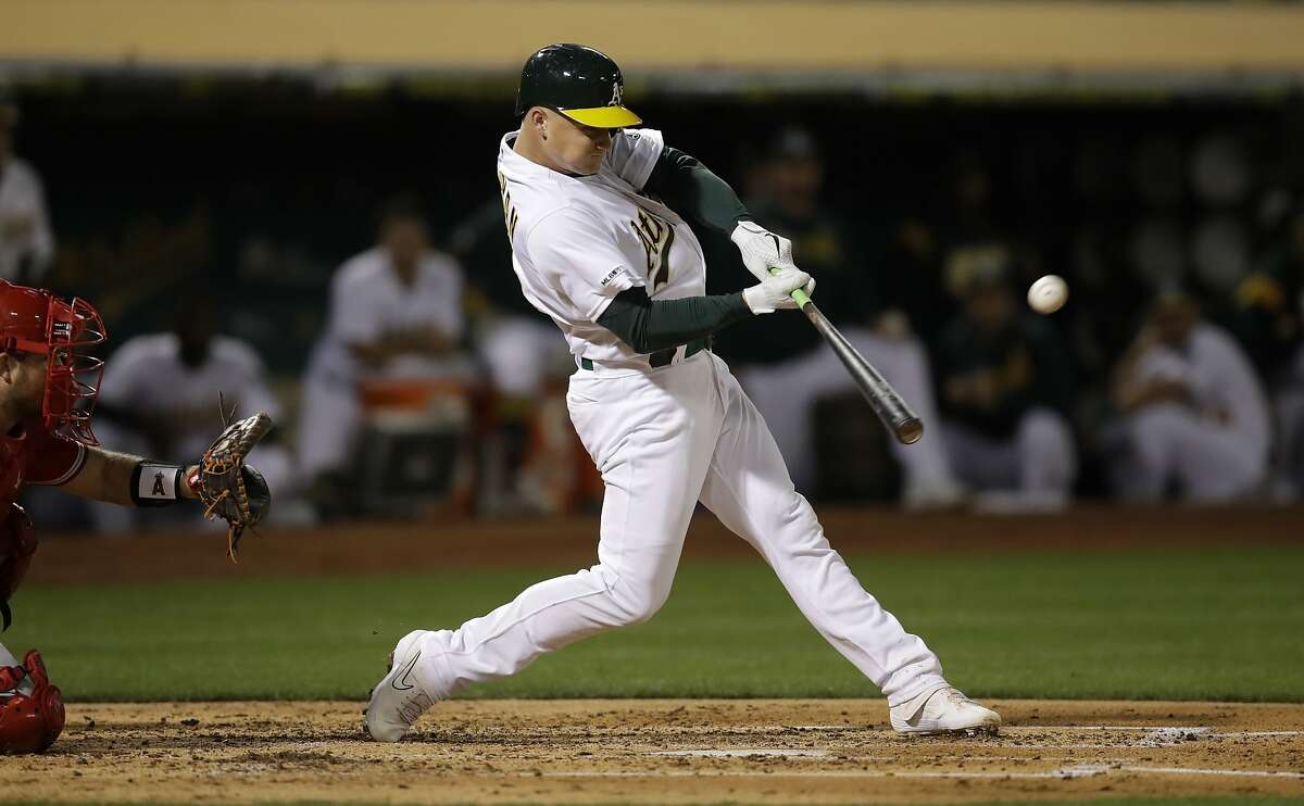 Oakland Athletics' Matt Chapman connects for a three-run home run off Los Angeles Angels' Jaime Barria during the third inning of a baseball game Tuesday, Sept. 3, 2019, in Oakland, Calif. (AP Photo/Ben Margot)