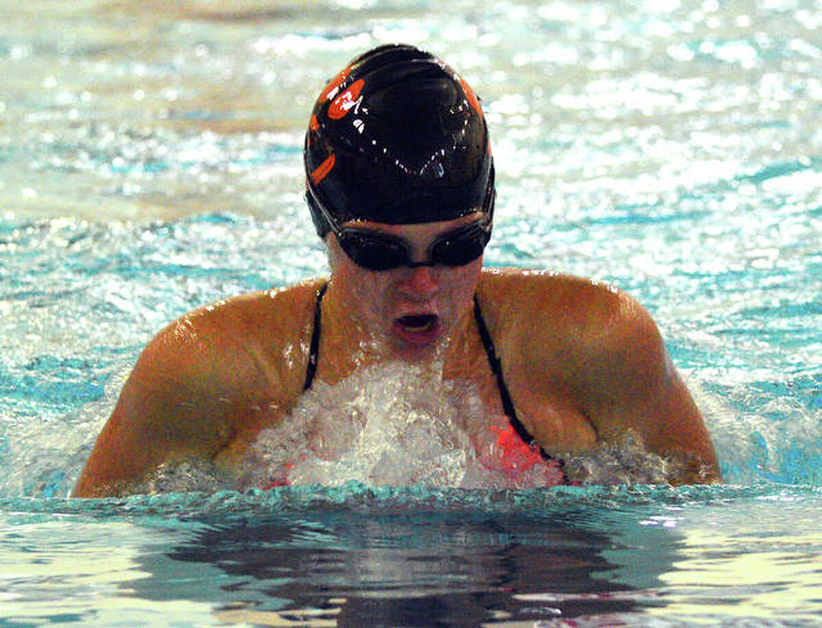 Edwardsville’s Jordan Schlueter swims in the 100-yard breaststroke during Tuesday’s dual meet against Champaign Central at Chuck Fruit Aquatic Center.