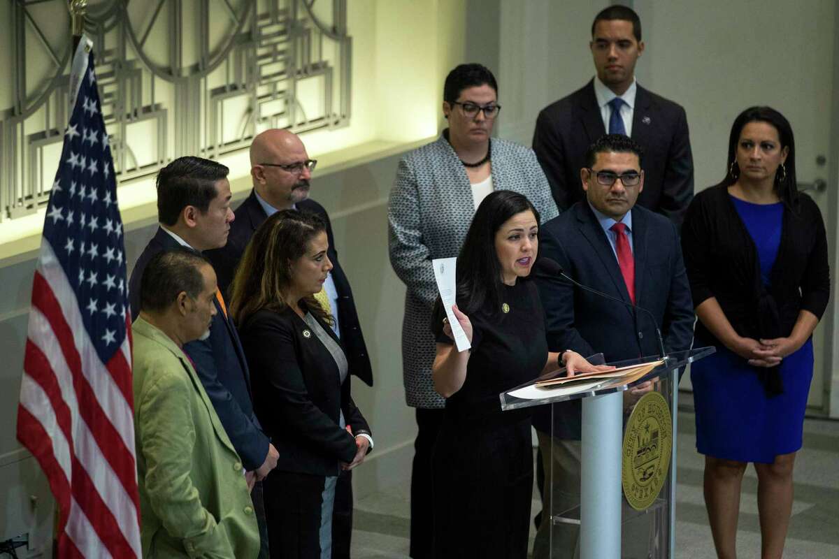 Rep. Ana Hernandez, standing with other members of the Texas House Democratic Caucus, speaks during a news conference to demand Gov. Greg Abbott to call a special session aimed at limiting gun violence on Wednesday, Sept. 4, 2019, in Houston. Hernandez is one of 65 members of the caucus who penned a letter to Abbott on Tuesday, urging a statewide stay-at-home order to reduce strain on Texas hospitals in the face of the coronavirus pandemic.