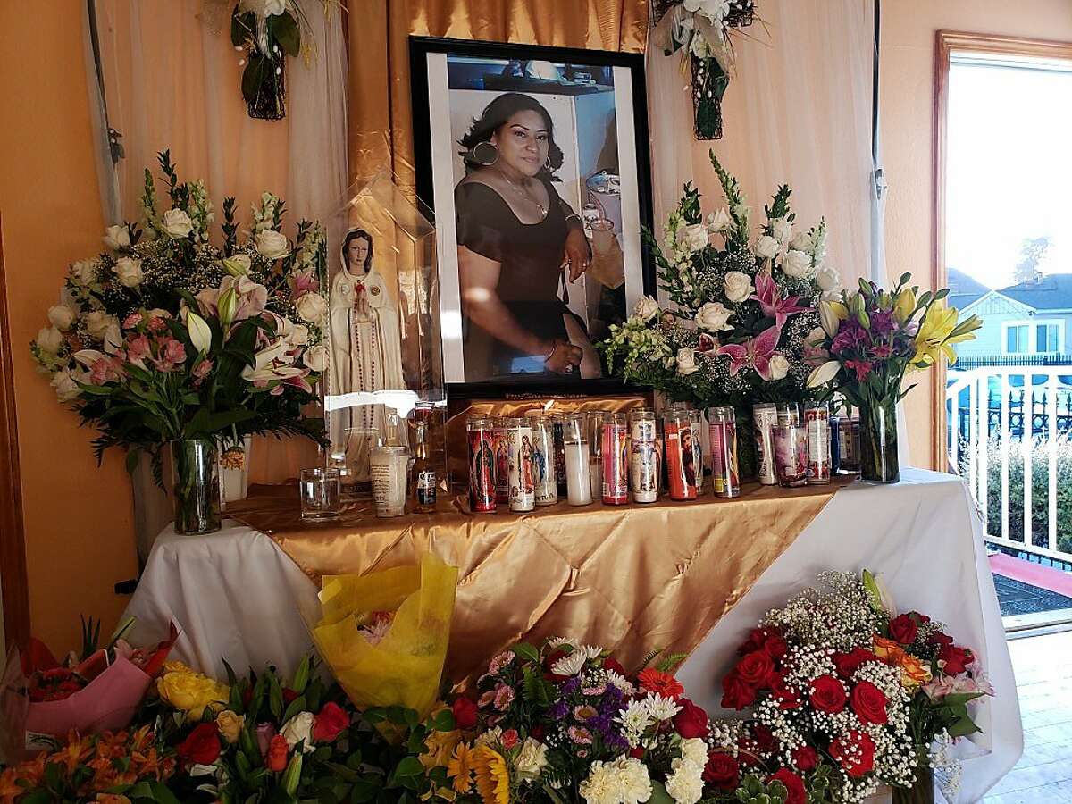 Family and friends of Martha Casiano attended a prayer Tuesday afternoon, where a portrait of Casiano was surrounded by flowers and candles.
