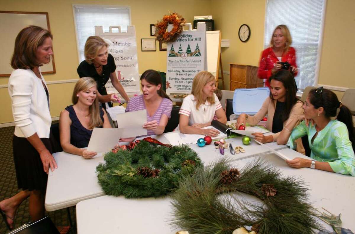 Committee members for the Junior League of Greenwich met Wednesday evening to discuss plans for The Enchanted Forest holiday event in November. Members, from left, are Anne Miller, Cheryl Heike, Chris Zadik, Brooke Bohnsack, Gayle Hagegard, Kim Miller, Jennifer Christiansen and Lauren Lazar.