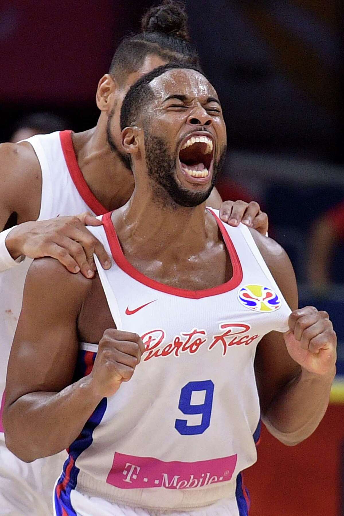 Puerto Rico's Gary Browne celebrates after his team's win against Tunisia at the Basketball World Cup Group C game in Guangzhou on September 4, 2019. (Photo by Nicolas ASFOURI / AFP)NICOLAS ASFOURI/AFP/Getty Images