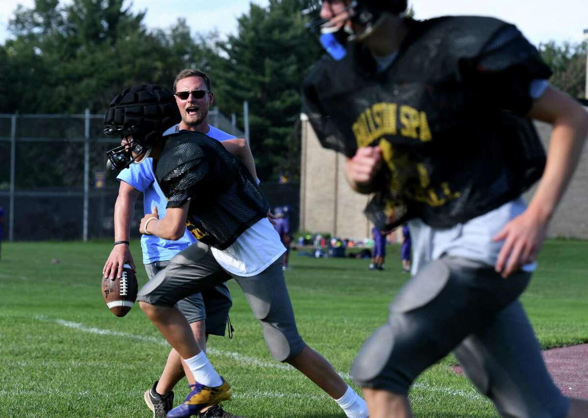 Ballston Spa varsity football coach Jason Ohnsman works with players during practice on Tuesday, Sept. 3, 2019, in Ballston Spa, N.Y. Ohnsman is a 29-year-old alum who played for the Scotties a decade ago. (Will Waldron/Times Union)