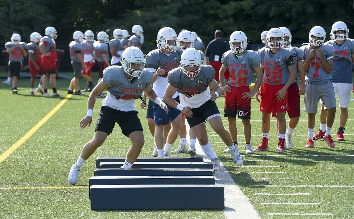 First day of conditioning/practice for Greenwich High School football, defending Class LL state champion, at the school in Greenwich on Aug. 26.