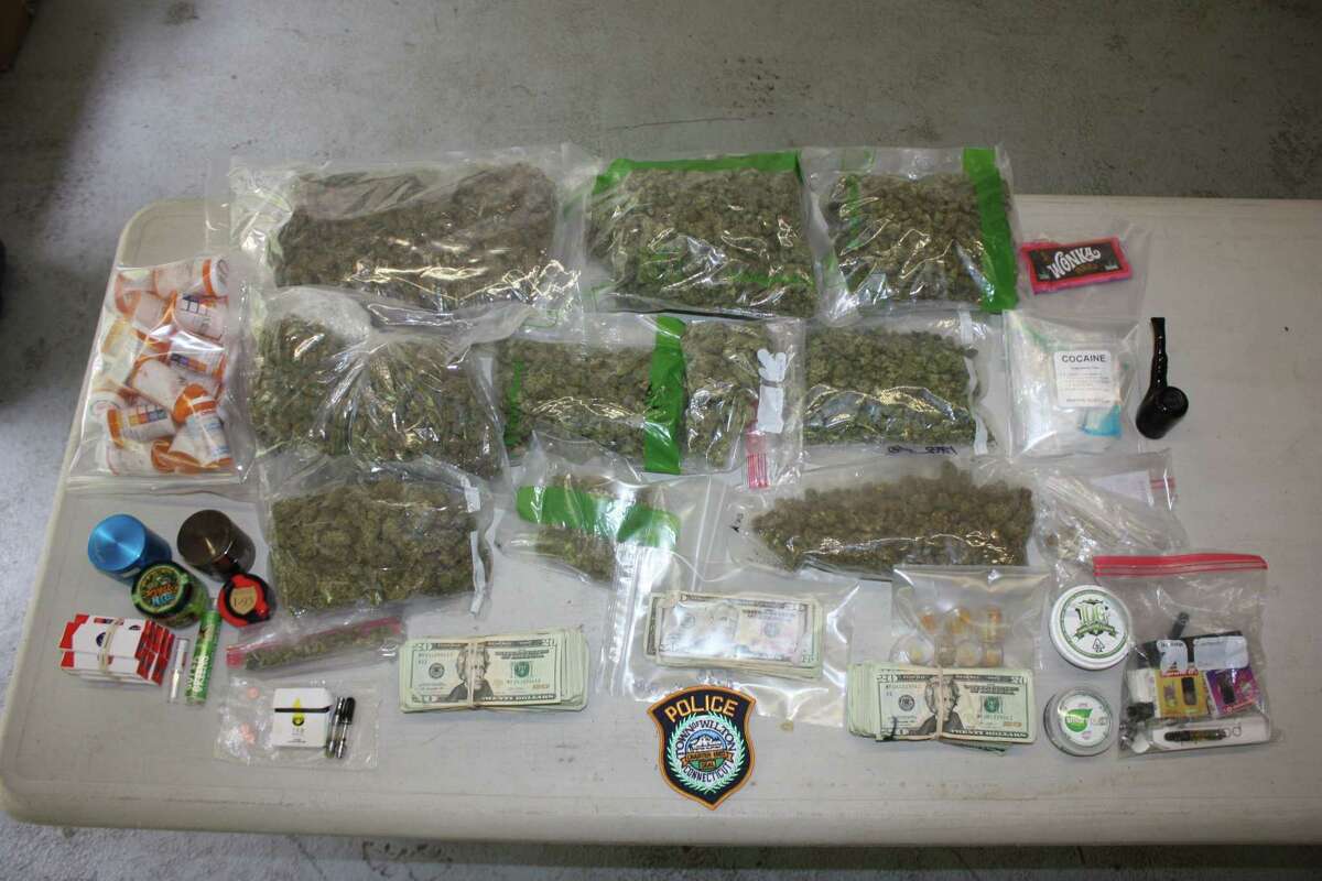 A photo Wilton police posted of the drugs and cash seized in arrest of Massachusetts man on Sept. 5.