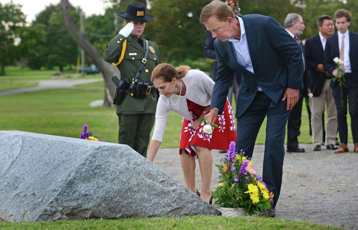 Governor Ned Lamont and Lt. Governor Susan Bysiewicz lay roses at the memorial as they host the State of Connecticut’s 18th annual 9/11 Memorial Ceremony honoring and celebrating the lives of those killed in the September 11, 2001 terrorist attacks on Thursday at Sherwood Island State Park in Westport. Family members of those who were killed in the attacks participated, and the names of the 161 victims with ties to Connecticut were read aloud.