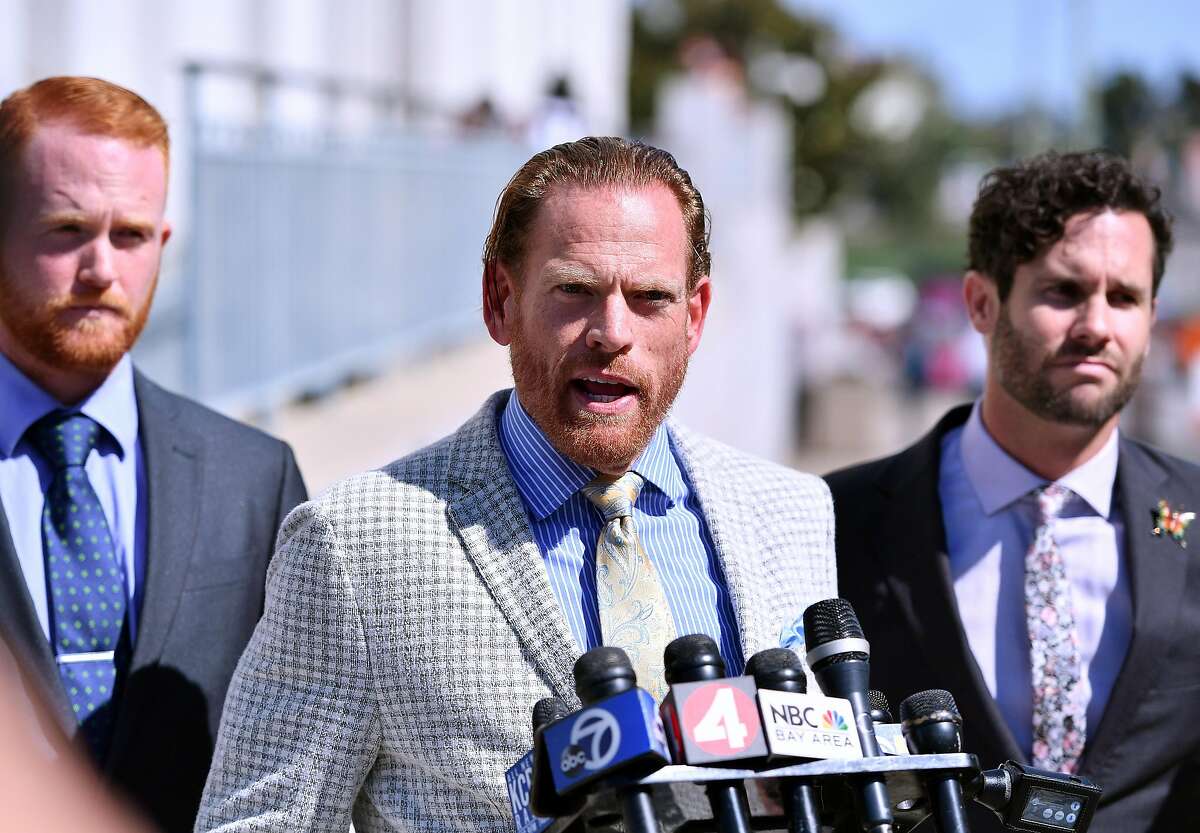 Defense attorney Curtis Briggs speaks to members of the media at the conclusion of the involuntary manslaughter trials of Derick Almena and Max Harris, co-defendants in the "Ghost Ship" fire, in Oakland on Sept. 5, 2019.