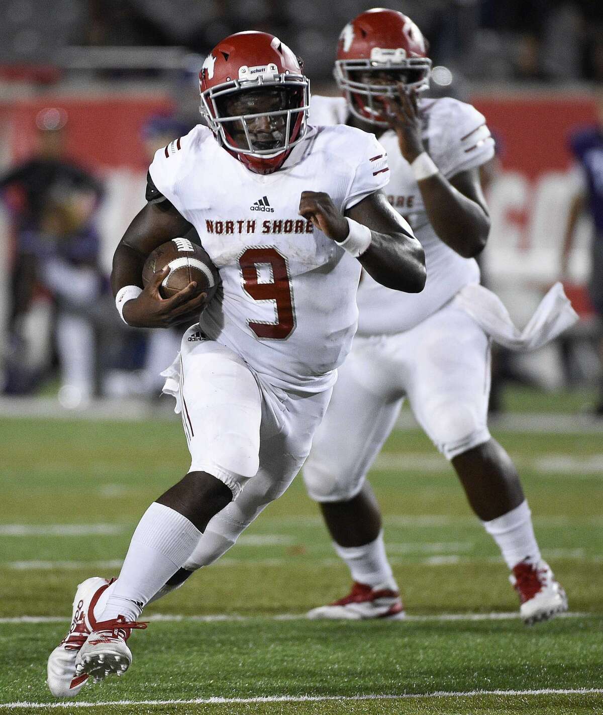 North Shore quarterback Dematrius Davis (9) runs for a touchdown during the second half of a high school football game against Ridge Point, Thursday, Sept. 5, 2019, at TDECU Stadium at the University of Houston.