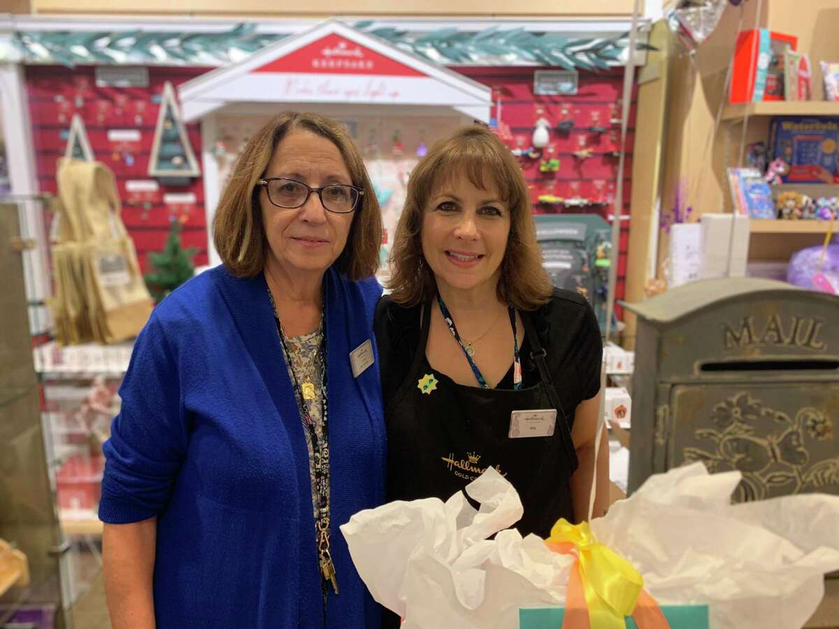 Store manager Linda at the Hallmark Store in the Trumbull Mall put smiles on senior's faces. From July 19-Aug 19, shoppers could participate in the Smiles for Seniors event at the local store. Shoppers could purchase and write out greeting cards for seniors, sending them a kind message to put a smile on their face. Each senior that participated received an average of six cards, including free admission to Sea Quest, who also supported the cause. The cards were handed out at the Trumbull Senior Center and throughout town.