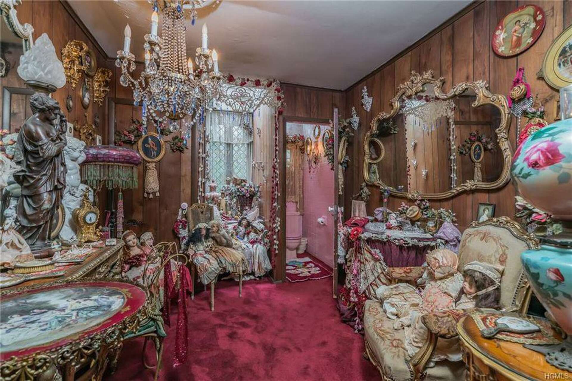 From Liberace-style decor to crazy doll room, home for sale just