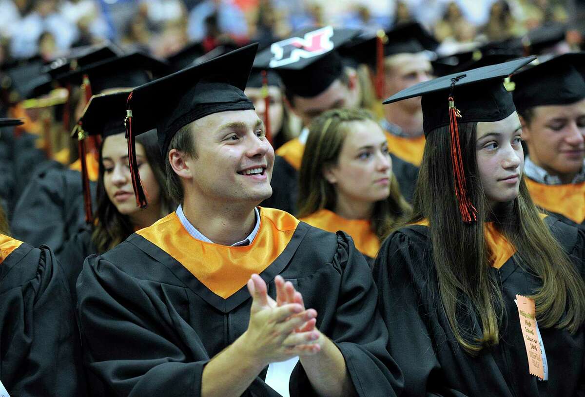 Thomas Formus applauds during Ridgefield High School's graduation ceremony held Friday, June 22, 2018, at the O'Neill Center at Western Connecticut State University.