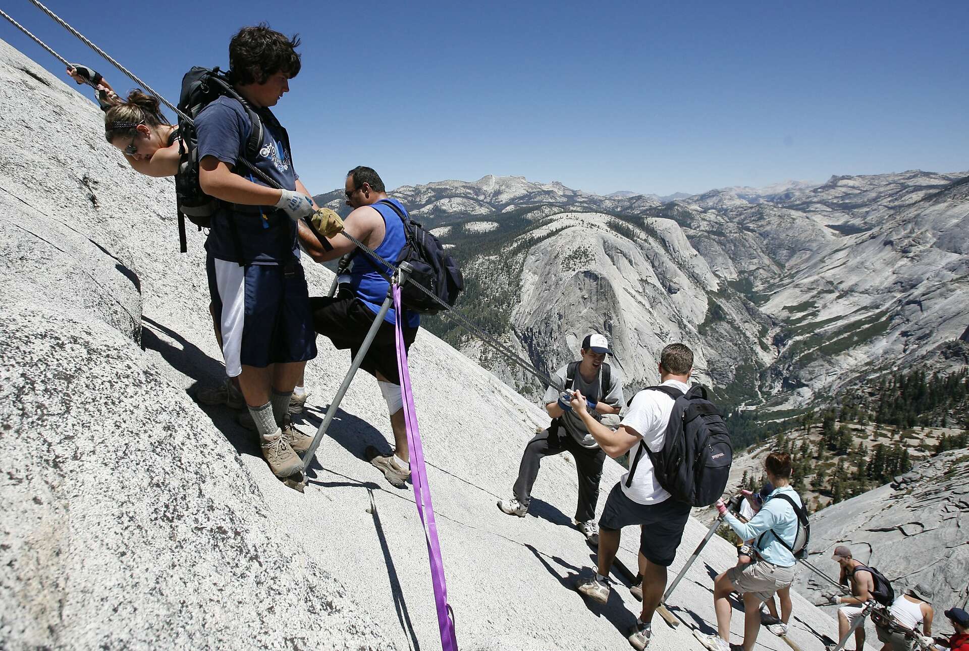 Half Dome hiker tried to grab Ariz. woman as she tumbled to her death