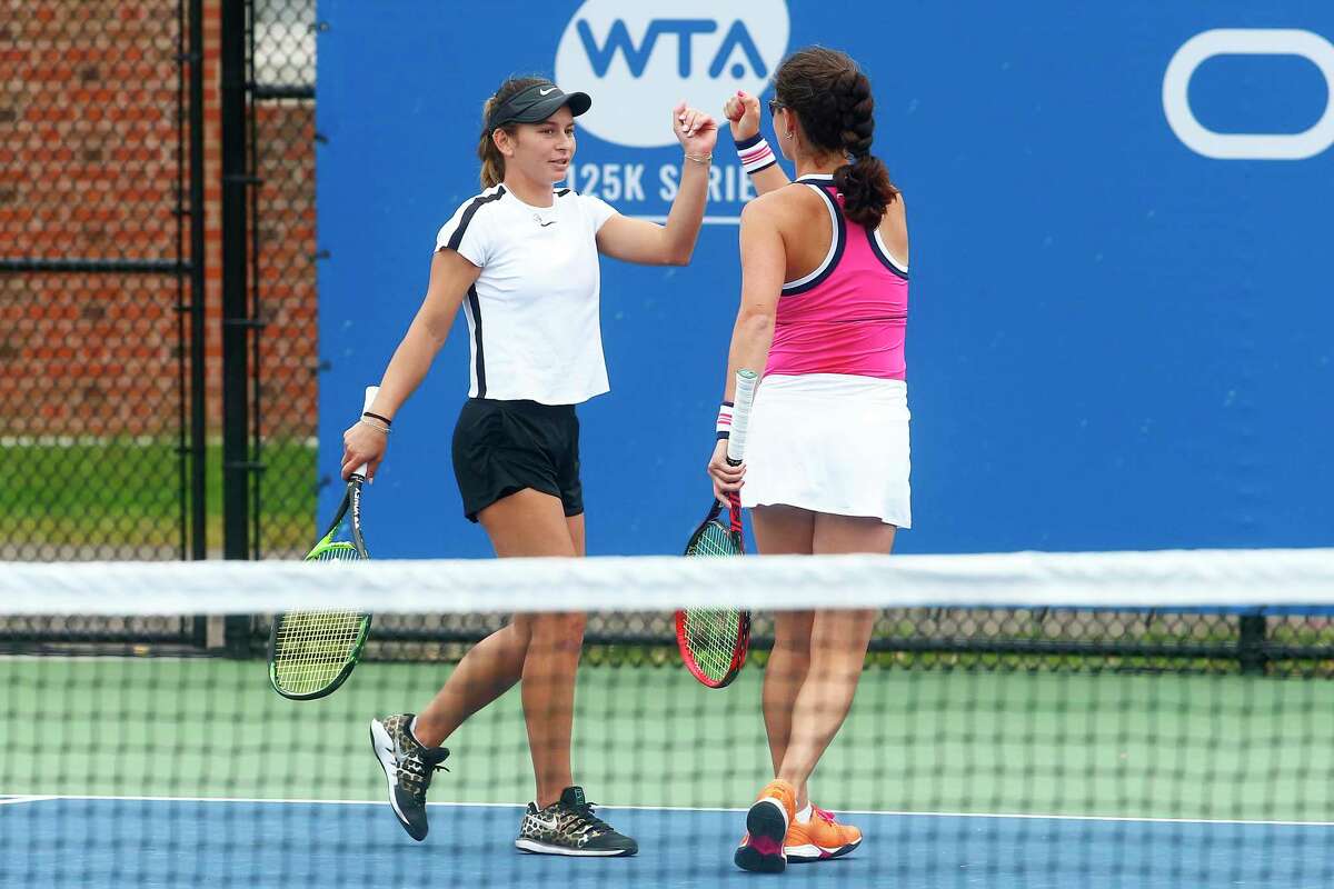 Usue Maitane Arconada, left, and Jamie Loeb celebrate during their match against Naomi Broady and Fanny Stollar at the Yale University Tennis Center during the Oracle Challenger Series on Friday in New Haven, Conn.