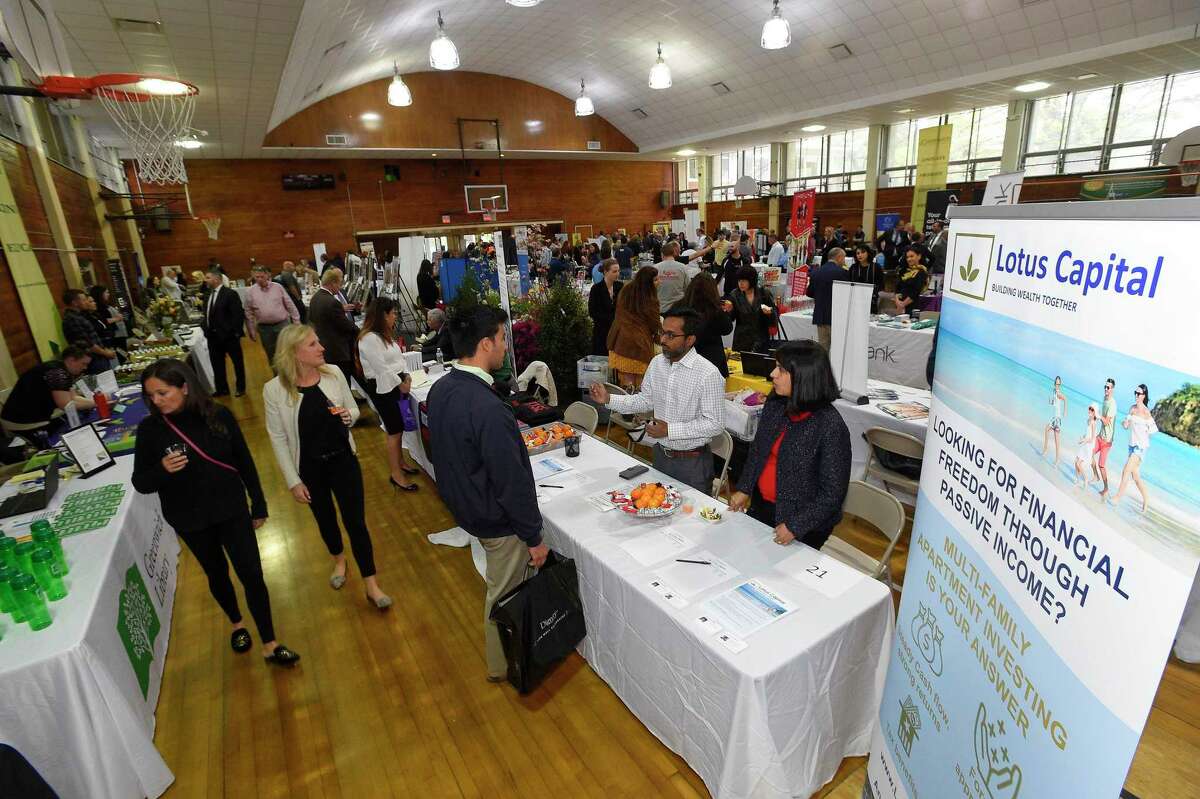Small businesses exhibit in April 2019 at a Greenwich, Conn. showcase sponsored by the Greenwich Chamber of Commerce. The Connecticut Department of Revenue Services is waiving penalties for some 10,000 businesses statewide late filing taxes, after confusion over changes to Connecticut tax law following the 2018 enactment of a new filing option for “pass-through” entities like limited liability companies and partnerships.