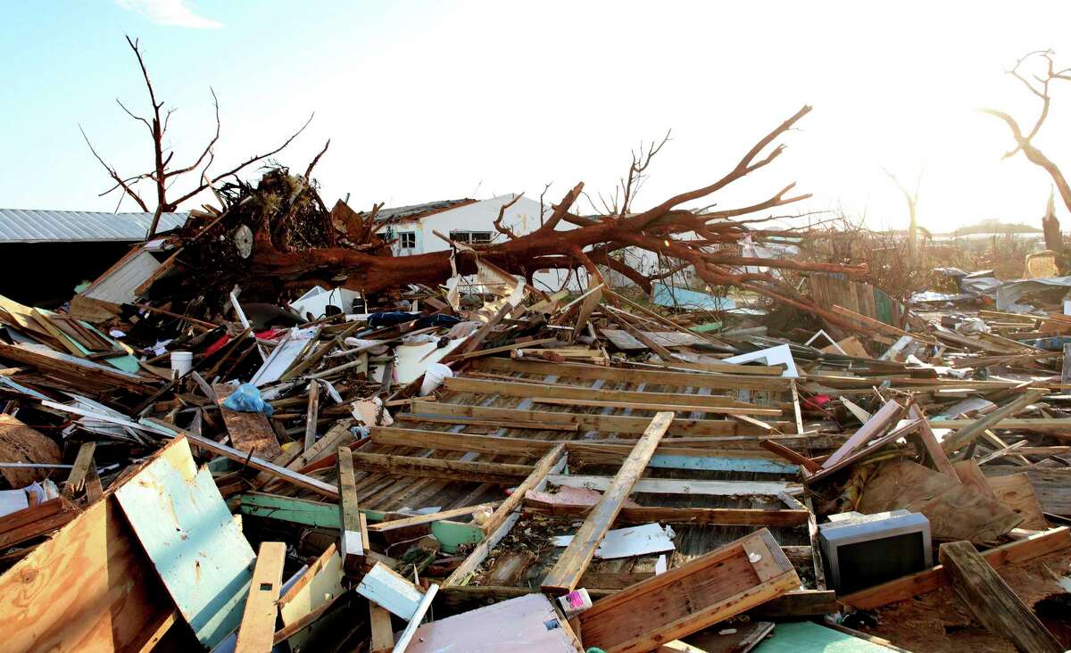 The extensive damage and destruction in the aftermath of Hurricane Dorian is seen in The Mudd, Great Abaco, Bahamas, Thursday, Sept. 5, 2019. The Mudd was built by thousands of Haitian migrants over decades. It was razed in a matter of hours by Dorian, which reduced it to piles of splintered plywood and two-by-fours 4 and 5 feet deep, spread over an area equal to several football fields.