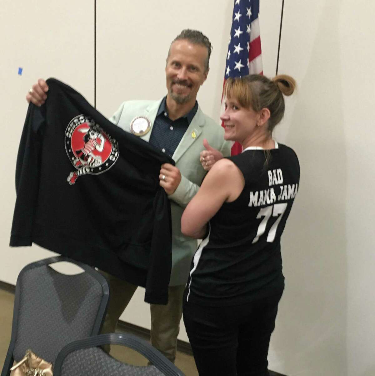 The Conroe Noon Lions Club and Program Chair Mike Sproba (l) welcomed Mary Keating (r), AKA ‘Bad Mama Jama’, who gave a bang-up program about Roller Derby and the Conroe Cutthroats.