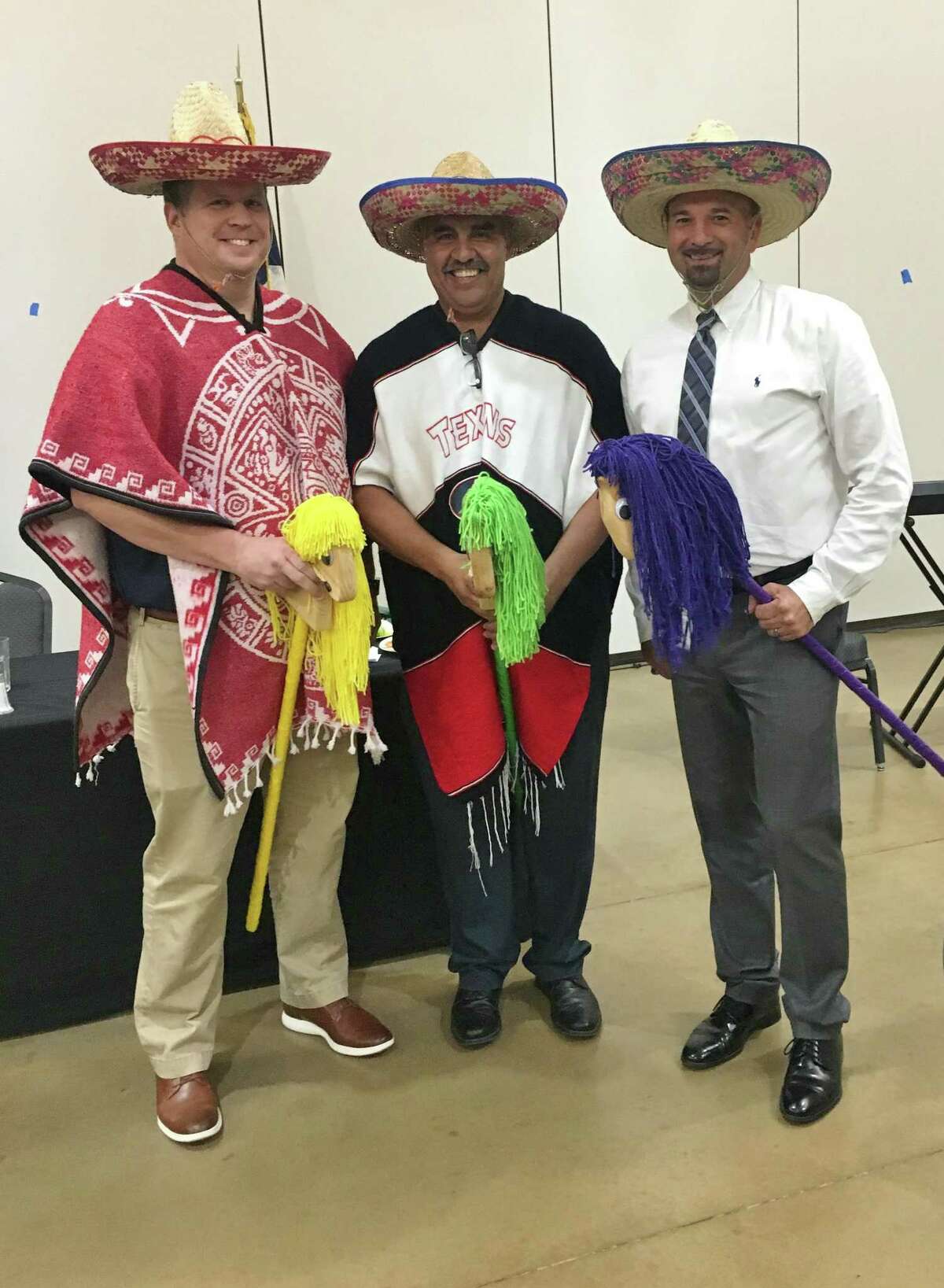 The Three Amigos (club Vice Presidents, l-r, Warner Phelps, Rafael Perez, Steve Williams) rode into the Conroe Noon Lions Club to announce the happenings coming up this week at the club’s annual Dinner/Dance &Auction being held Thursday night at the Lone Star Convention Center.