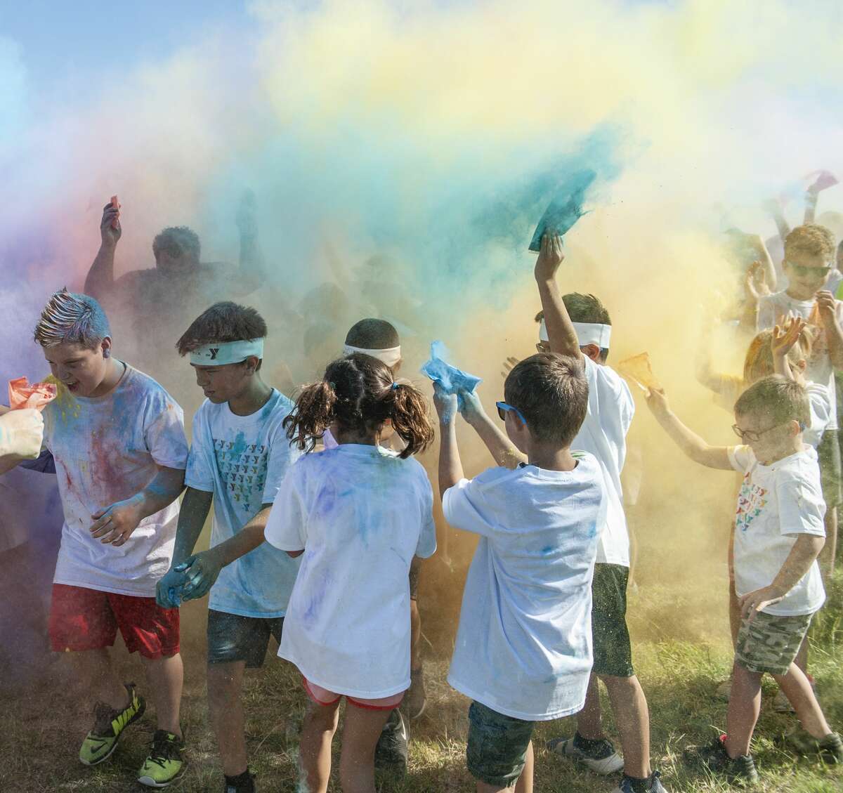 Children from around the area participate 09/07/19 in the YMCA Kids Color Fun Run at Tumbleweed Park. Tim Fischer/Reporter-Telegram