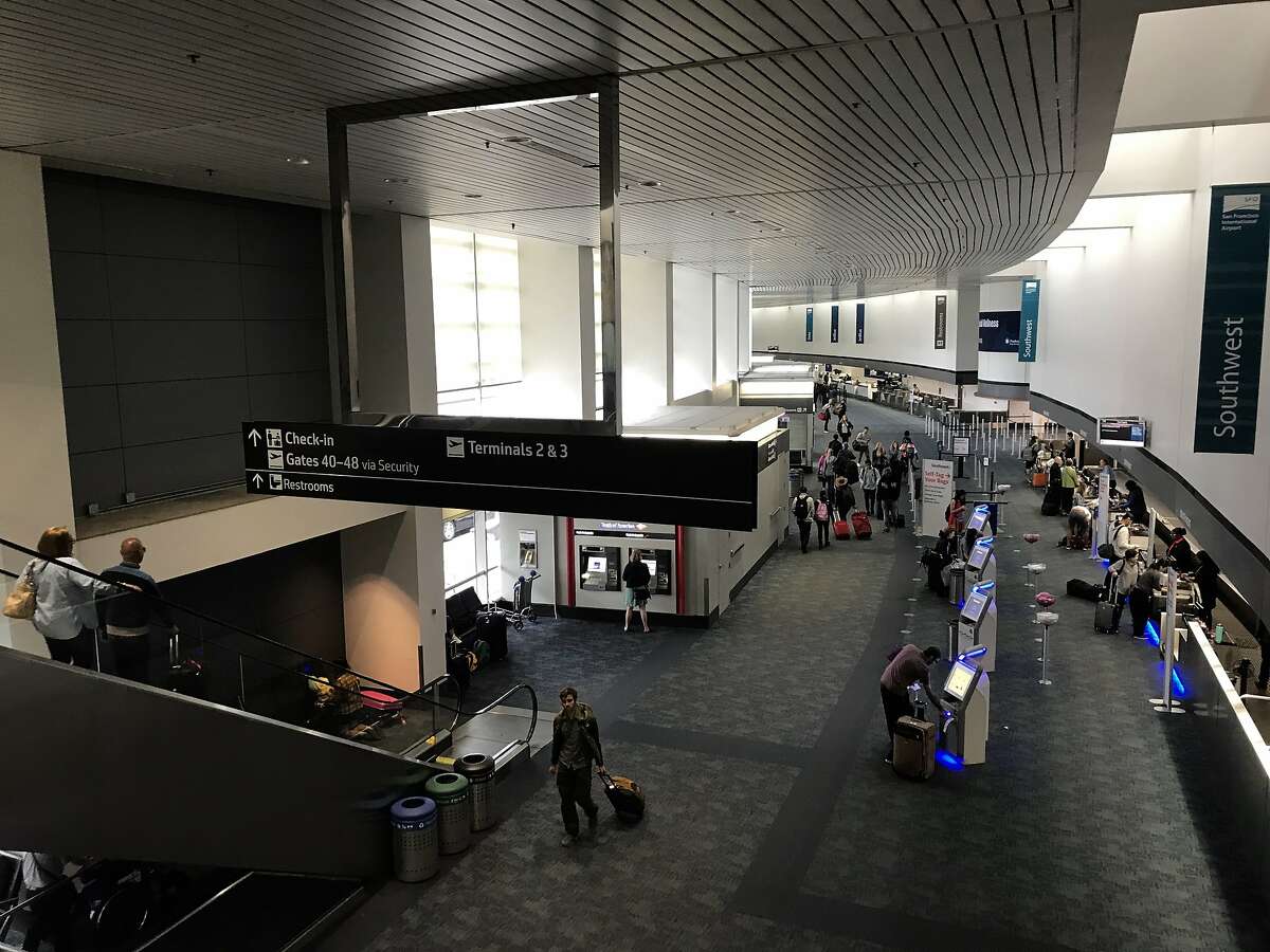Travelers walk through the ticketing section of Terminal 1 at San Francisco International Airport on Saturday, Sept. 7, 2019. Saturday marked the start of construction on the airport's busiest runway section, which delayed 160 flights, canceled 89 flights, and caused snaking lines of restless travelers.
