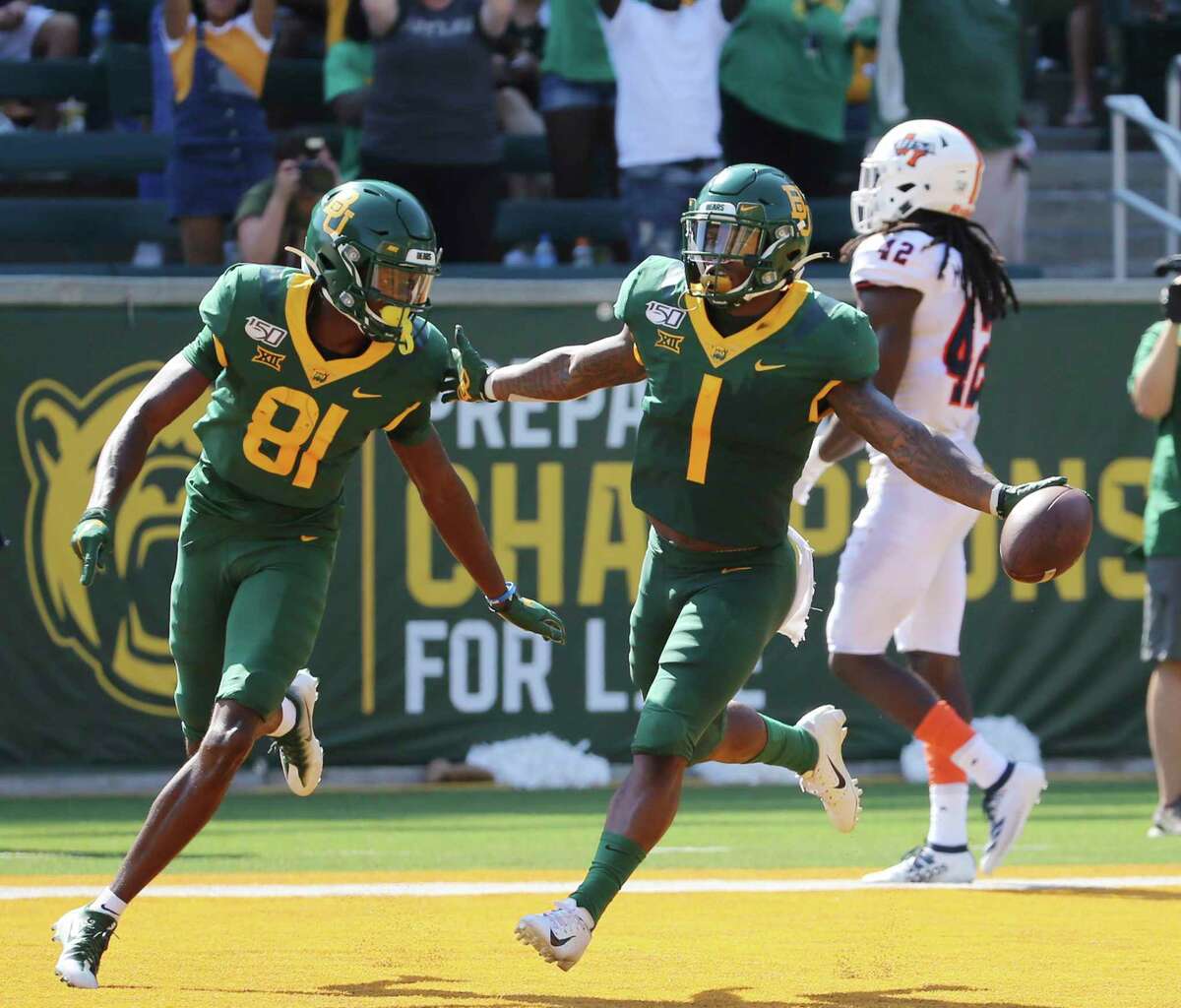 Baylor cornerback Grayland Arnold, right, celebrate with wide receiver Tyquan Thornton, after his punt return touchdown against UTSA in the first half of an NCAA college football game, Saturday, Sept. 7, 2019, in Waco, Texas. (Rod Aydelotte/Waco Tribune-Herald via AP)