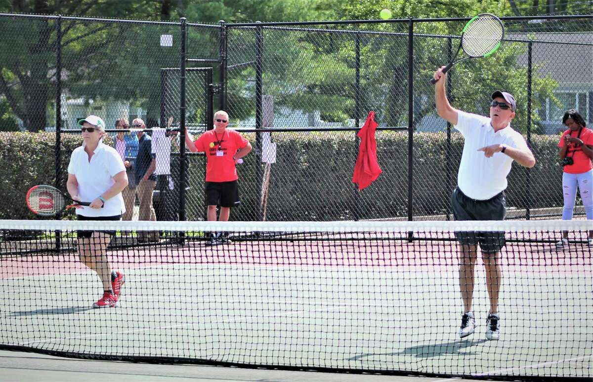 Gov. Ned Lamont showed some country club form on the tennis courts in West Hartford Saturday Sept. 8, 2019 in a tournament for the Connecticut State Employees Campaign for Charitable Giving. He's shown with doubles partner Beth Bye, former state senator, now commissioner for early childhoood.
