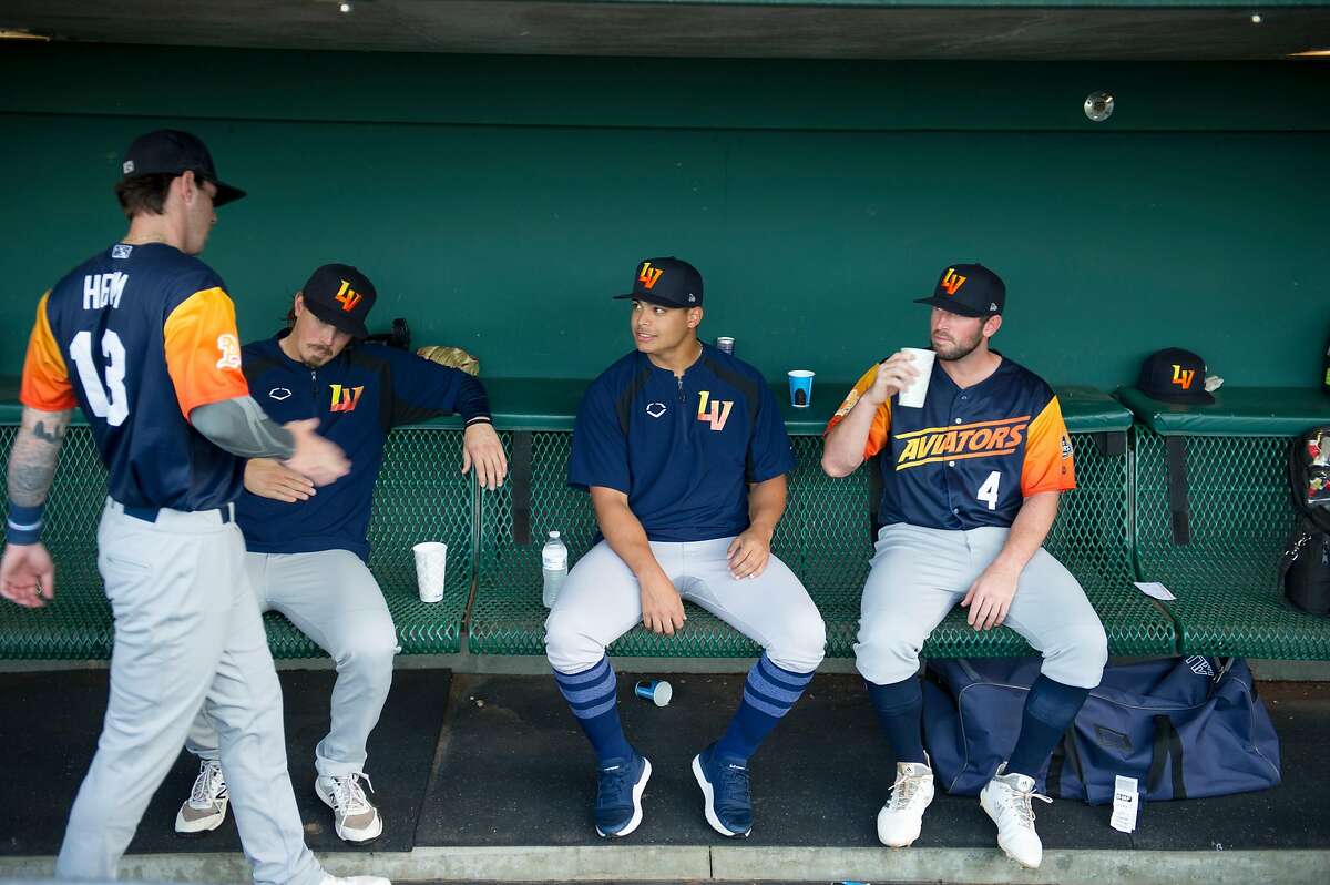 Las Vegas Aviators pitcher Jesus Luzardo, center, visits with teammates during the first Pacific Coast League championship series game against the Sacramento River Cats at Raley Field in Sacramento, Calif. on Wednesday, Sept. 4, 2019.
