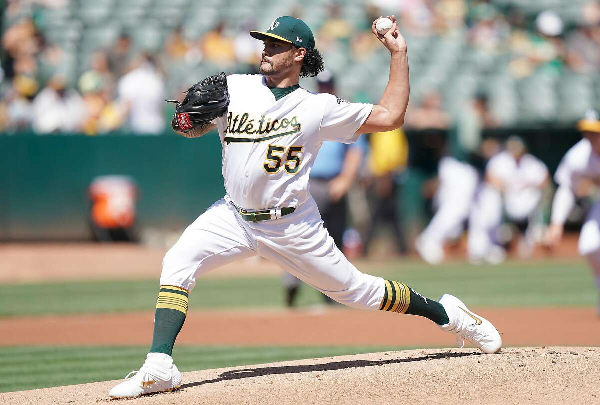 OAKLAND, CALIFORNIA - SEPTEMBER 08: Sean Manaea #55 of the Oakland Athletics pitches against the Detroit Tigers in the top of the first inning at Ring Central Coliseum on September 08, 2019 in Oakland, California. (Photo by Thearon W. Henderson/Getty Images)