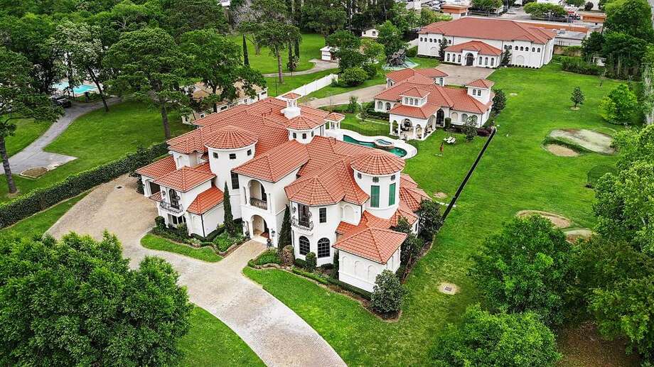 Located in west Houston in the Rivercrest neighborhood, this $6.5 million mansion was once owned by former Houston Rockets point guard Mike James. At 11,384 square feet, the recently remodeled home boasts 11 bedrooms, 10 full and one half bathrooms, a professional sports complex with an indoor basketball court and a resort-style pool. Photo: TK Images/Houston Association Of Realtors