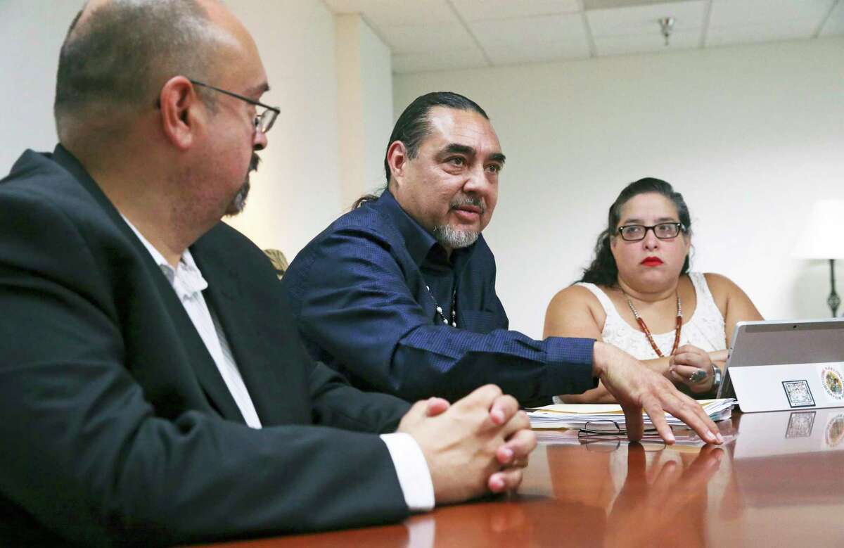 Ramón J. Vasquez, center, discusses his views as leaders of the Tap Pilam Coahuiltecan Nation meet with the Express-News Editorial Board on Aug. 15, 2019. On the left is Art Martinez de Vara, the group’s tribal counsel. On the right is Karla Aguilar, development coordinator with Tap Pilam’s nonprofit entity, American Indians in Texas at the Spanish Colonial Missions. A lawsuit filed by the Tap Pilam says sacred remains at the Alamo are not being adequately protected in an ongoing state project.
