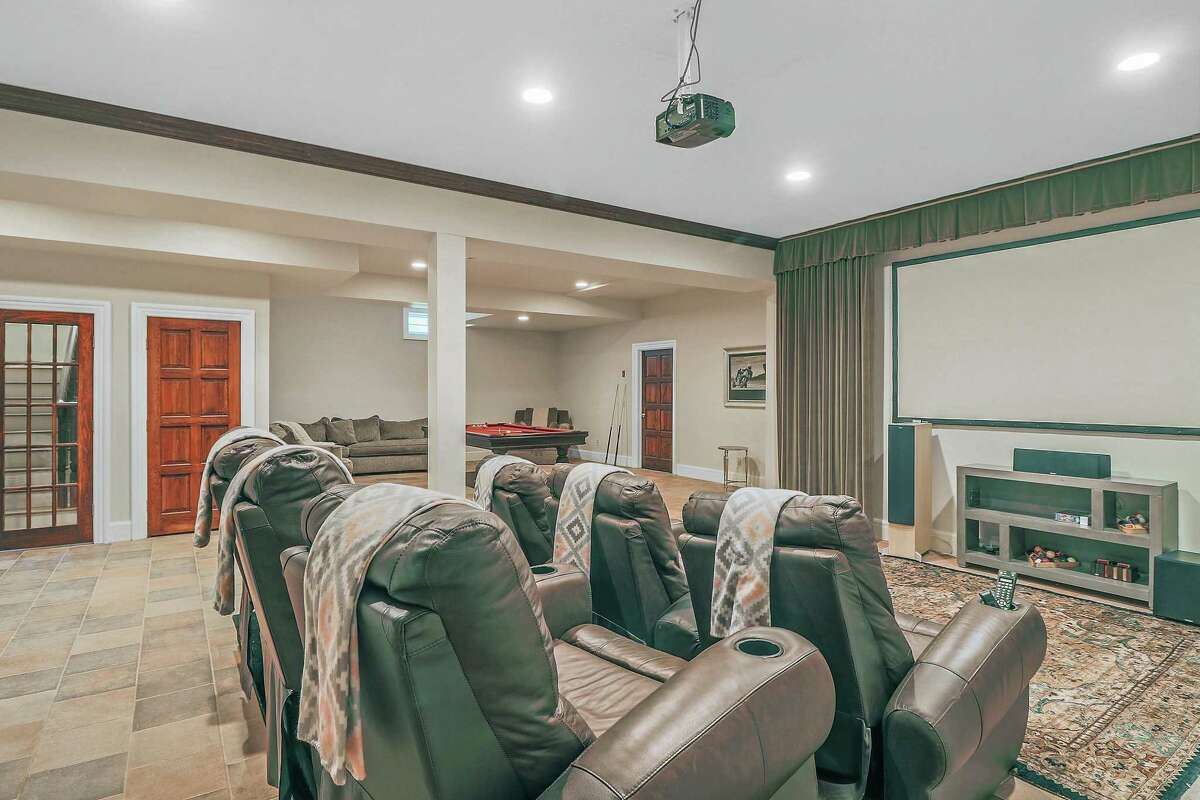 There is a six-seat home theater on the lower level.