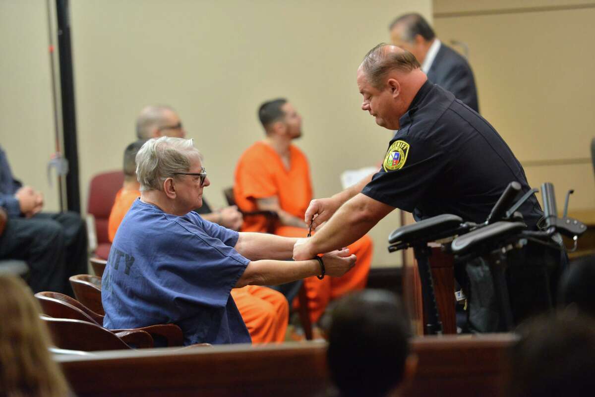 Convicted baby killer Genene Jones is handcuffed as she arrives for a hearing Monday morning in the 399th state District Court. Jones, a former pediatric nurse, was convicted in 1984 of fatally injecting Chelsea McClellan of Kerrville with a powerful medication. After her attorney withdrew his motion for a competency trial MOnday, the judge decided that Jones will stand trial on additional murder charges in February.