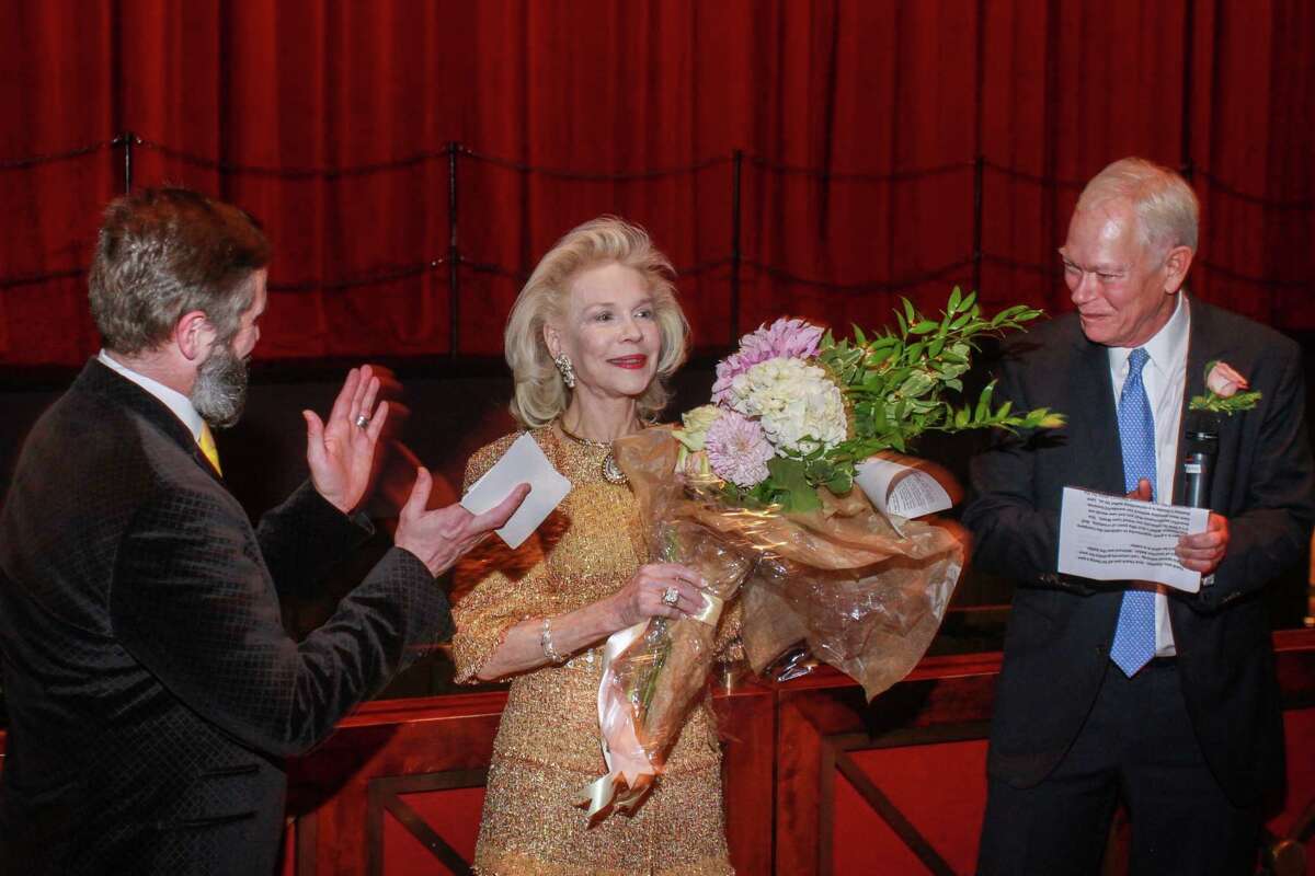 Stanton Welch, from left, Lynn Wyatt and Jay Jones speak to guests as they are waiting for the onstage dinner after Houston Ballet’s season-opening performance of “Giselle.”