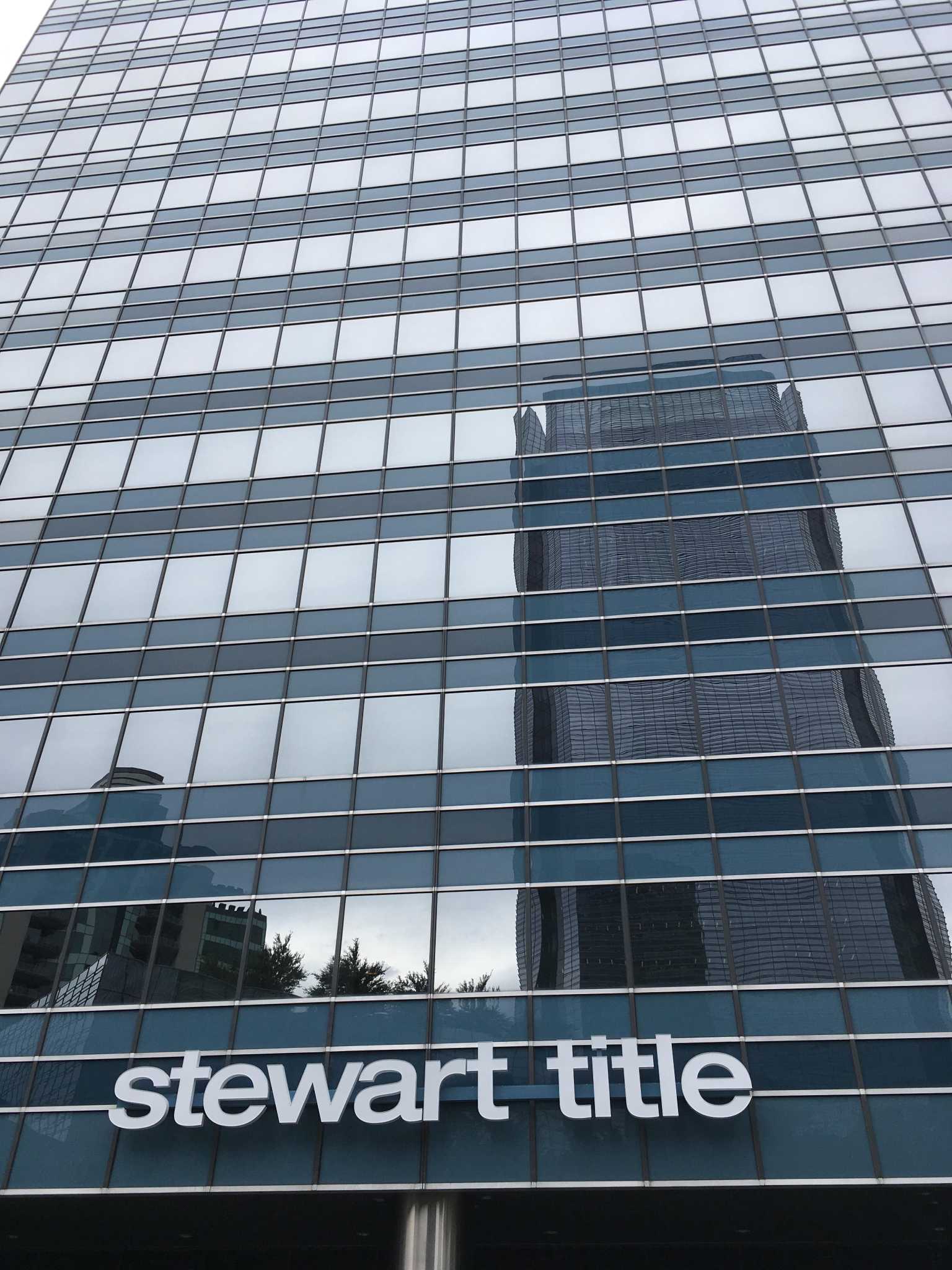 Stewart Title parent reports fourth quarter profit