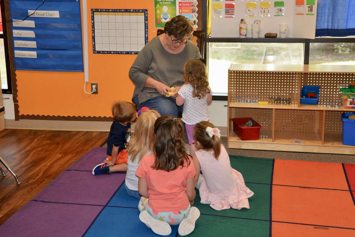 Tracey Roome is assistant director of the Midland College Children’s Center at Manor Park. The center offers an intergenerational program, in which the children interact with the elderly residents at Manor Park.