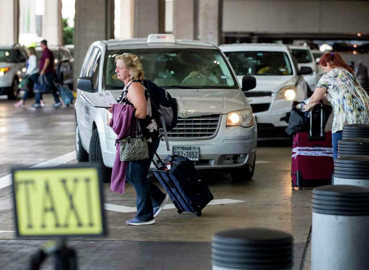 City to aid struggling taxi drivers with new rules, lower fees