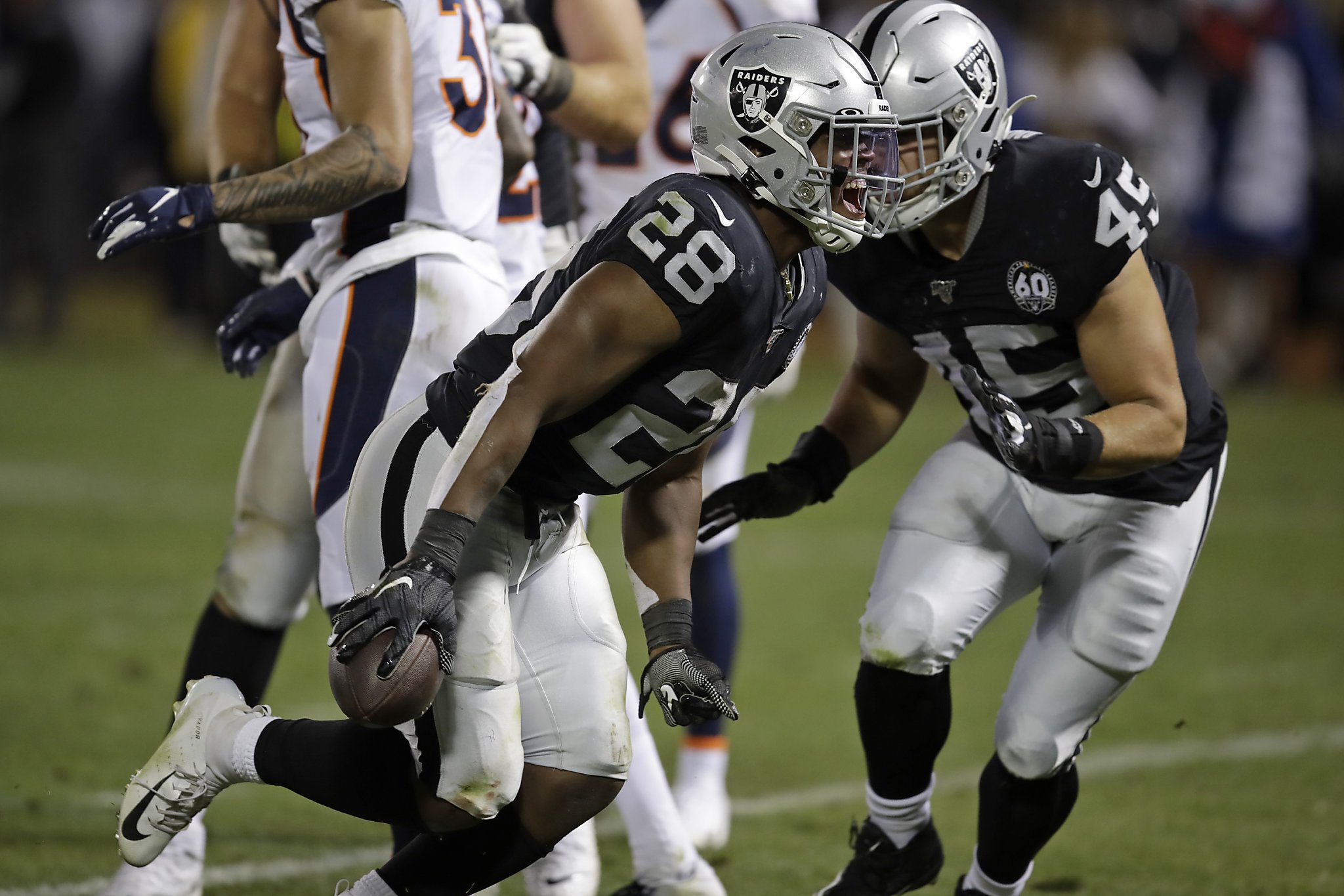 Oakland Raiders running back Josh Jacobs (28) warms up prior to an