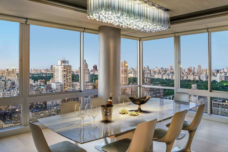 This New York City apartment, which uses a Savant home automation system installed by Stamford-based Rich AV Design to bring together TVs, music (via invisible speakers), HVAC control, and motorized shades by both Lutron and Savant, as well as a custom Ketra/Lutron human centric lighting system, won the 2018 Silver Award for Electronic House Home of the Year. Photo: David Allee / / Connecticut Post