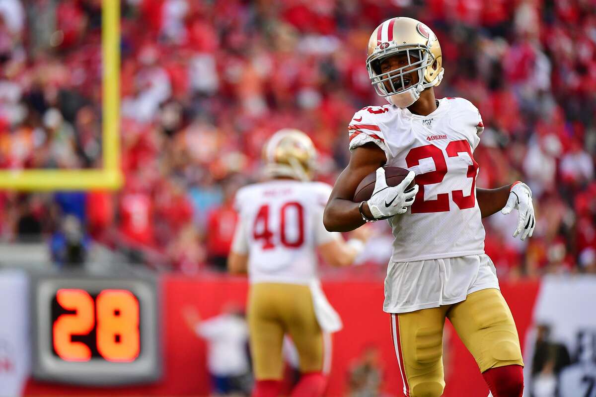 Los Angeles Rams defensive back Ahkello Witherspoon rips away the ball for  an interception