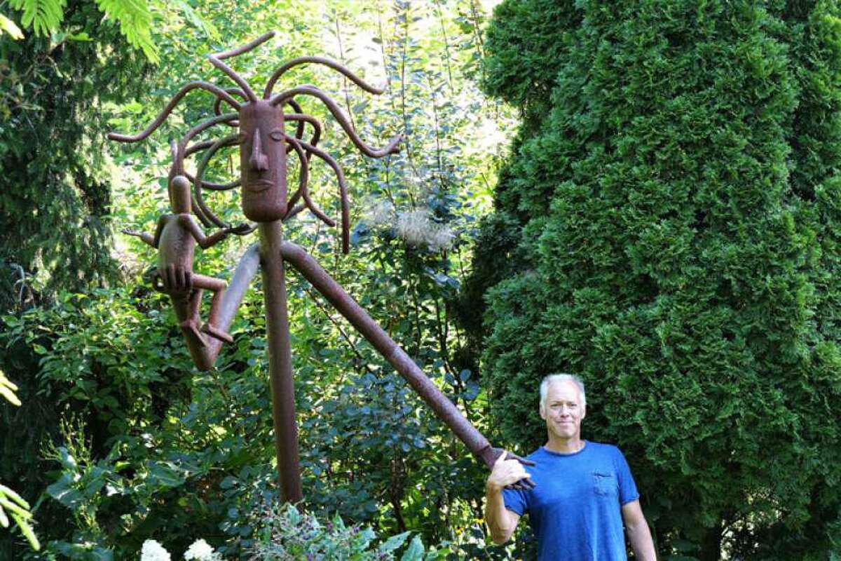 Joe Keller stands in the Garden of Ideas, which started on the small residential property where Keller grew up, learning gardening — and the love of it — from his mother, Terry Keller.